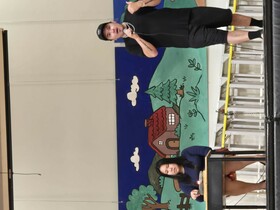 William Komaksiutiksak and his wife on stage at York Street Public School
