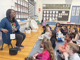 Grade one students with guest speaker