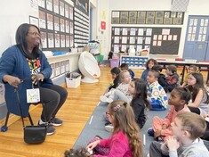 Grade one students with guest speaker